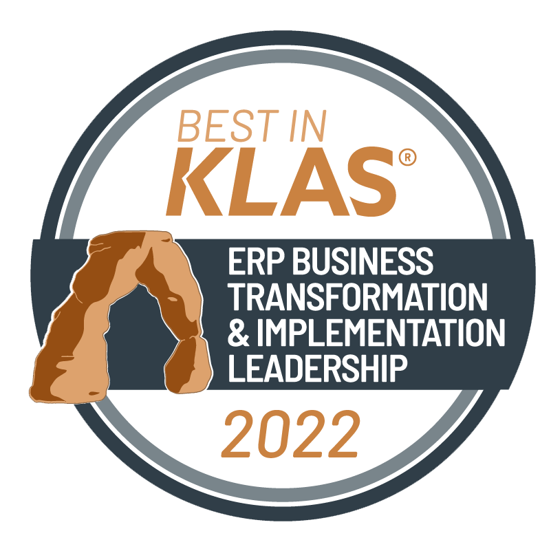 Here you go: A circle logo that says Best in Klas (trademark) - ERP Business Transformation and Implementation Leadership 2022, with a drawing of a natural brown stone archway.